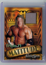 Triple H 2003 Fleer Matitude Aggression event-used ring mat relic