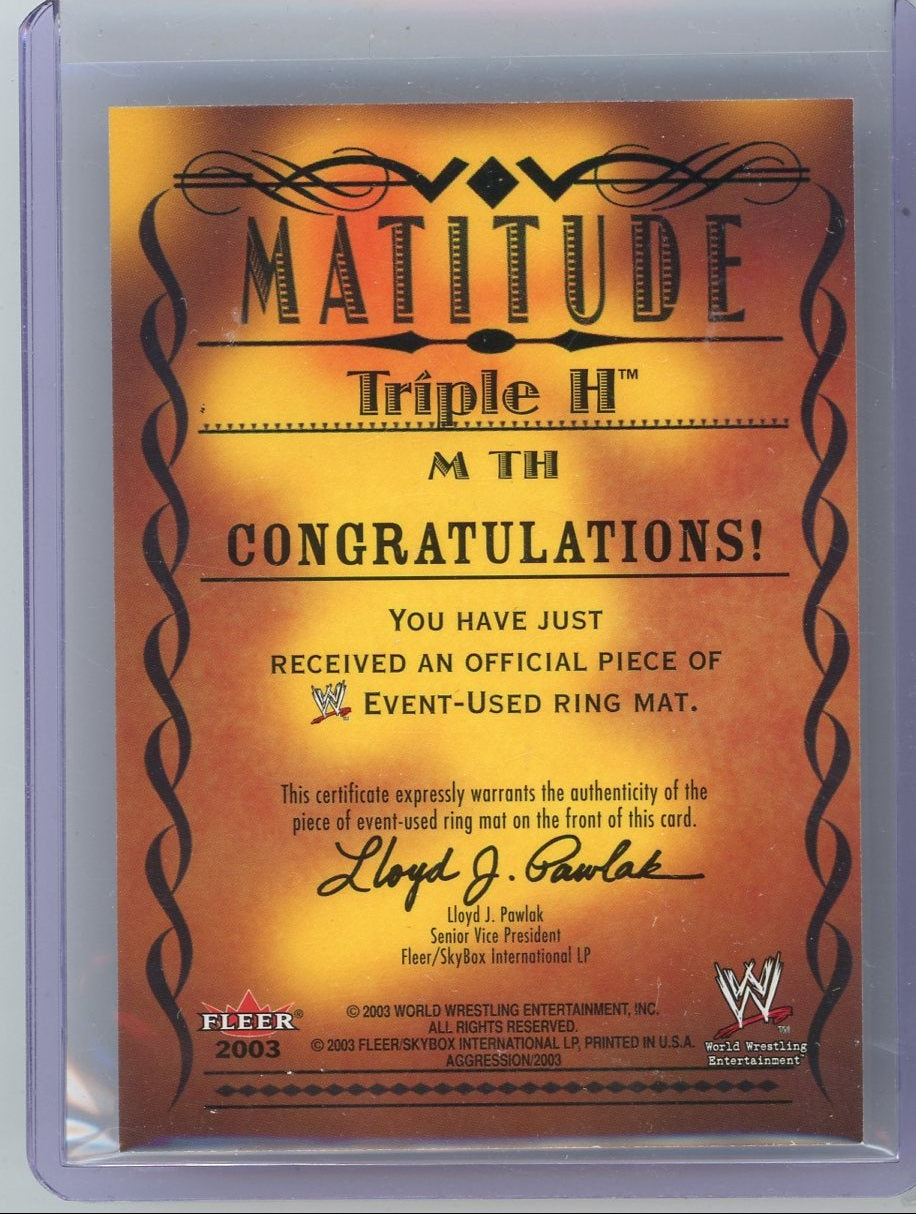 Triple H 2003 Fleer Matitude Aggression event-used ring mat relic