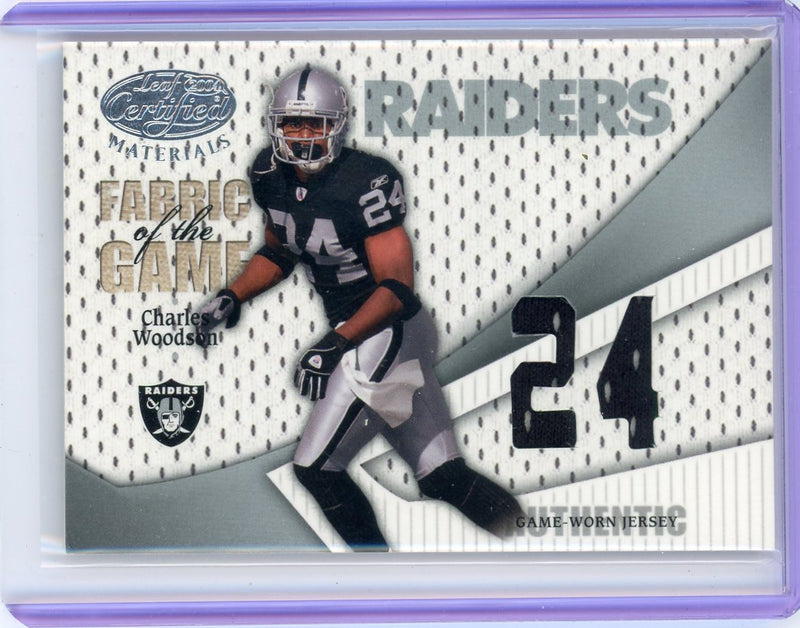 Charles Woodson 2004 Donruss Playoff Leaf Certified Fabric of the Game 24 jersey relic 