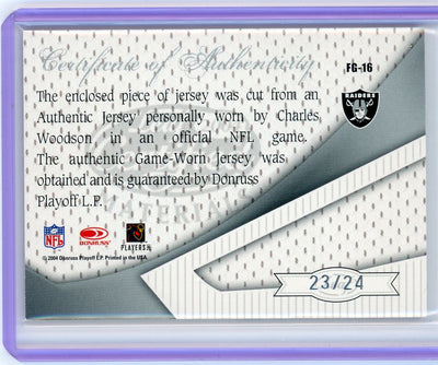 Charles Woodson 2004 Donruss Playoff Leaf Certified Fabric of the Game 24 jersey relic #'d 23/24